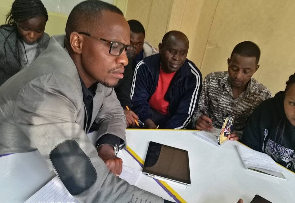 Teachers and caregivers during an NEIC training session